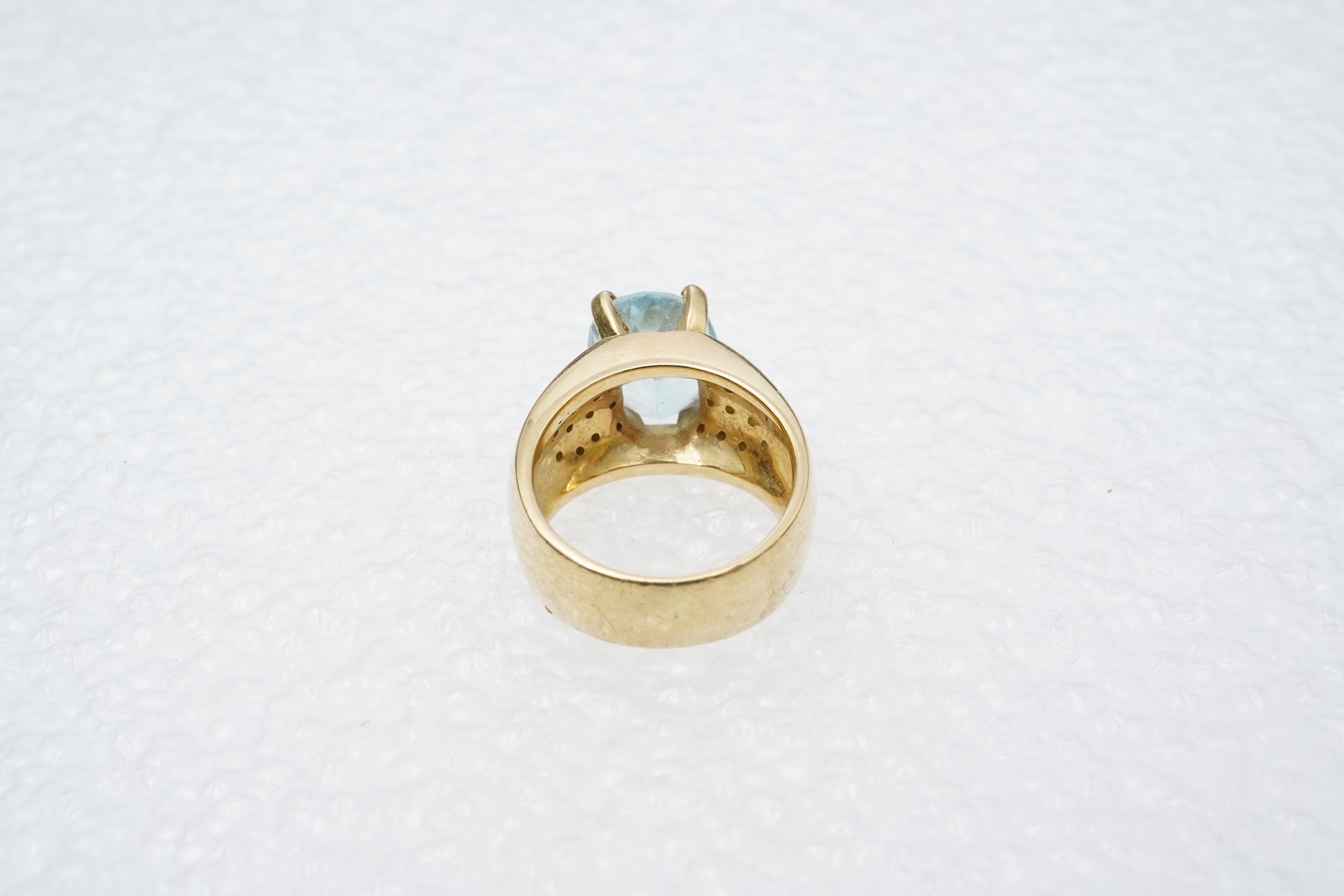 An aquamarine and diamond ring